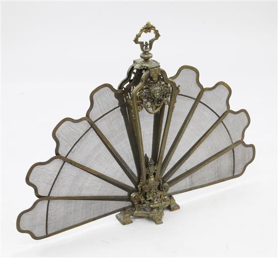 A late 19th / early 20th century French bronze folding fan shape fire screen, 33.5in.